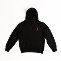 A black hoodie with a small embroidered sauce bottle on the chest. Extra Hot is printed across the back in white.